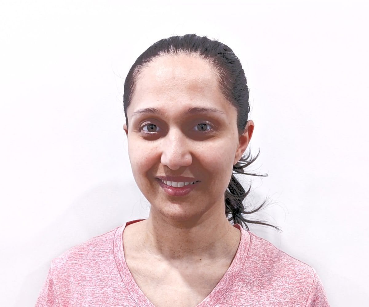 Pranali Buch, smiling, in the studio.